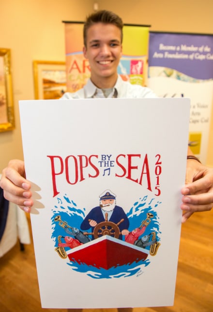 Nicholas Glaser of Saint John Paul II High School with his winning design for the 2015 T-Shirt Scholarship Competition
