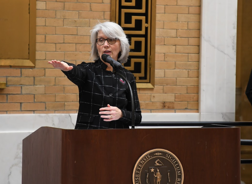 Dr. Mary Grant giving a speech at the Massachusetts State House during Arts Advocacy Day on January 2024. 